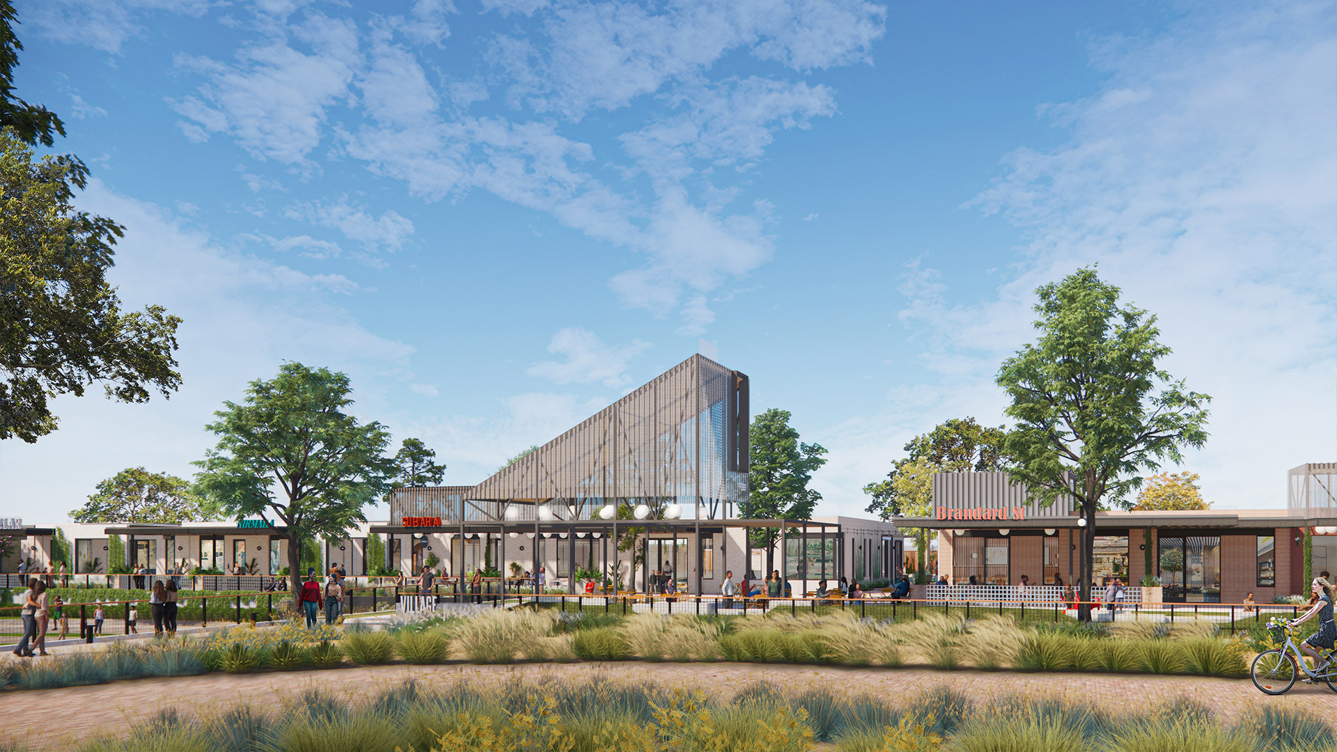 Rendering of the low-rise retail buildings at Greenside with landscaping and an open lawn