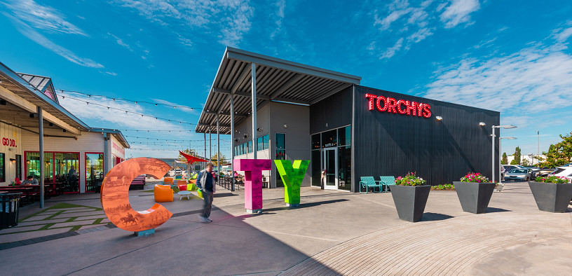 Torchy’s Tacos at Greenside, with large colourful letter sculptures outside