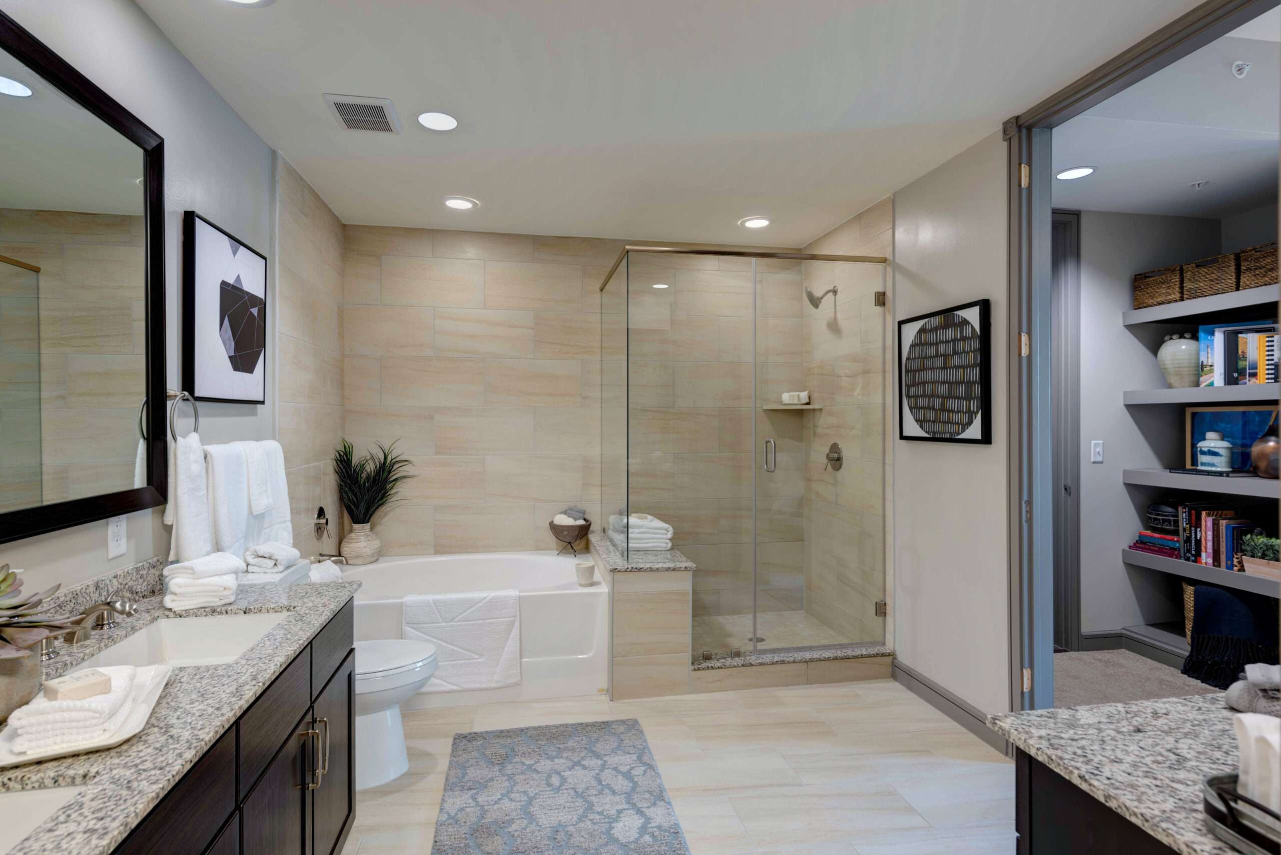 Bathroom at The McAdams with a soaking tub, glass shower and double vanity