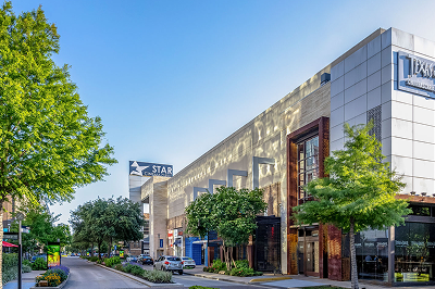 Street view of the retail and restaurant buildings at a MetroNational development
