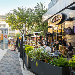 Diners on the outdoor terrace at Yard House in CityCentre